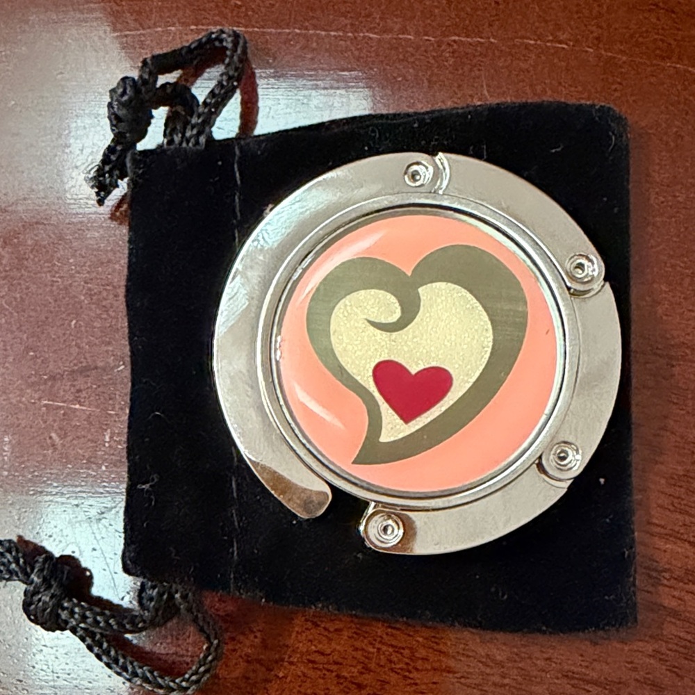 Foldable Purse Hook or sweater hook in Coral and Cream Heart Motif. Well made.